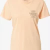 Volcom T-shirts T-shirt Chedelic Femme Abricot -Magasin d'usine Volcom a373de53e1ca83064d637aa246b1ce1c 1 scaled
